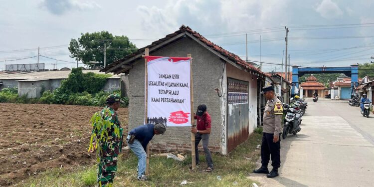 Hindari Gesekan Warga Payang-Tambaharjo, Banner di Jalan Sengketa Dicabut